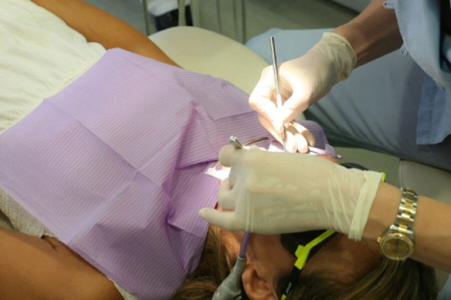 dental patient undergoing root canal therapy