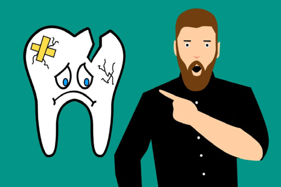 cartoon man points to a cracked frowning  cartoon tooth